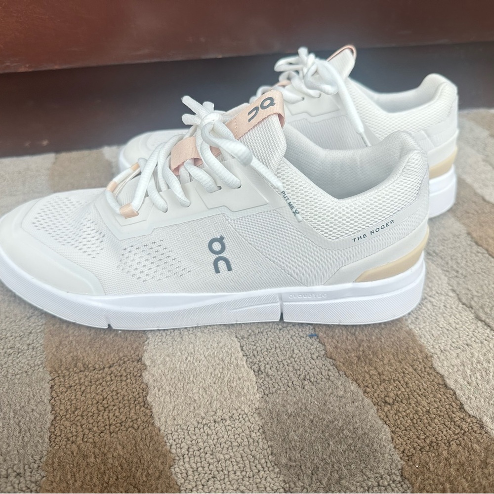 On Running White and Tan Athletic Shoes